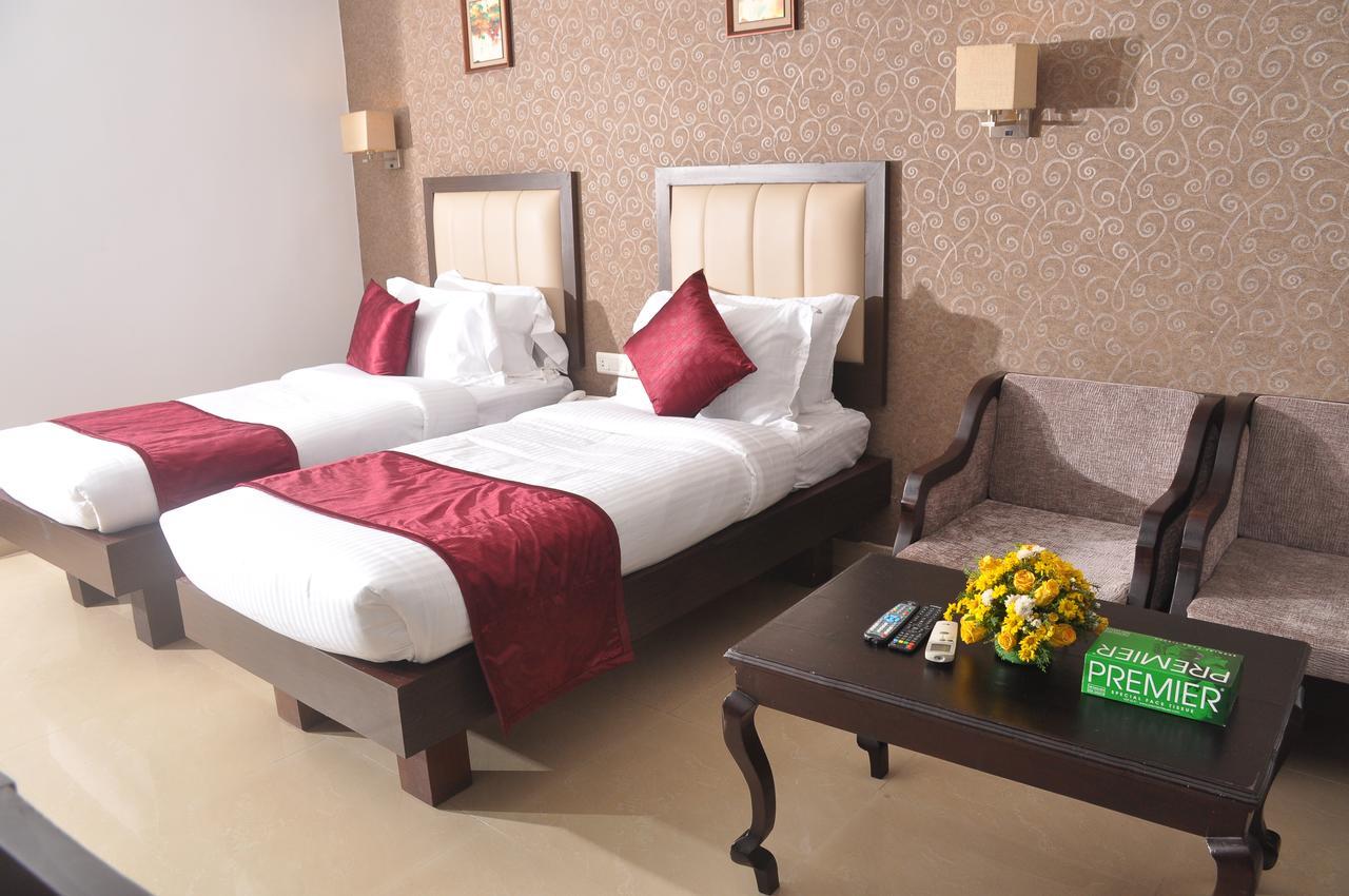 Broad Bean Hotel Tellicherry ภายนอก รูปภาพ