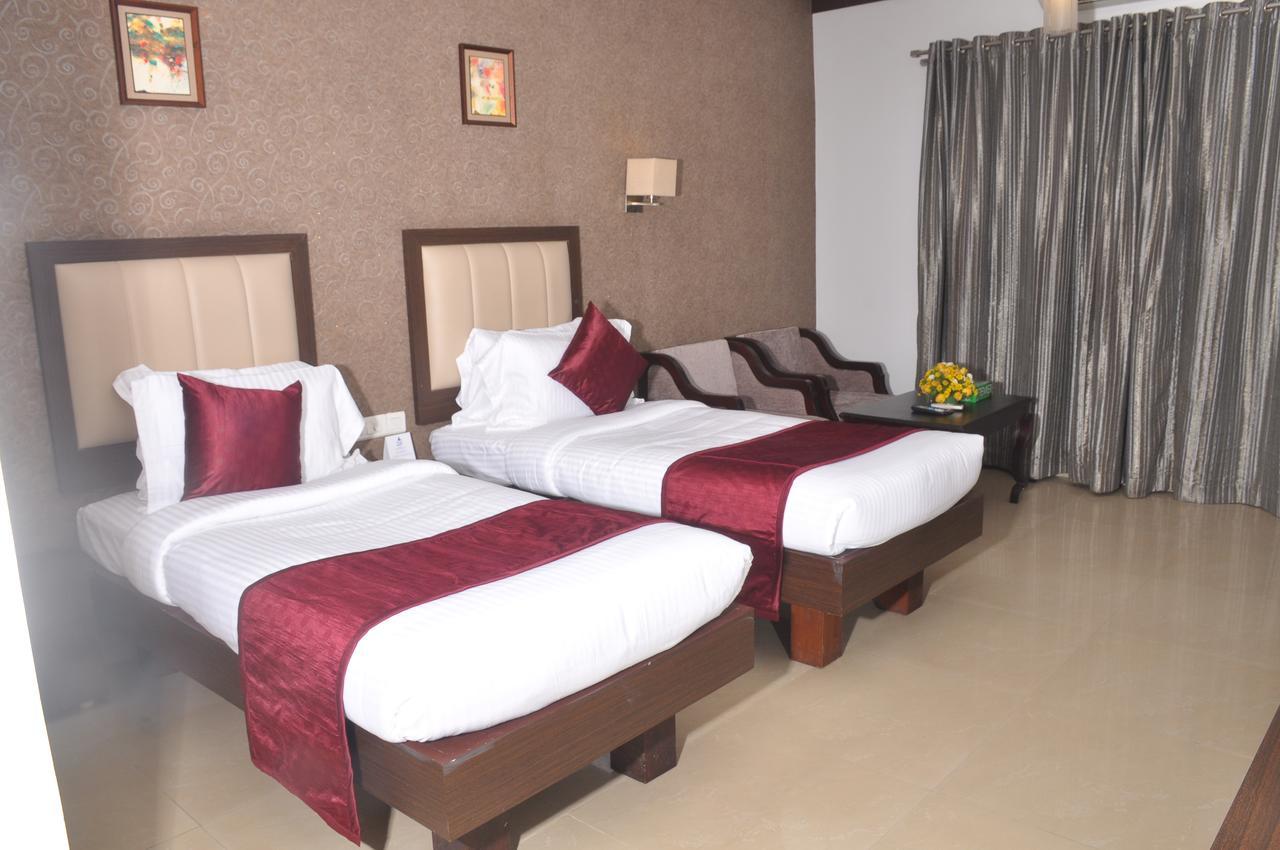 Broad Bean Hotel Tellicherry ภายนอก รูปภาพ